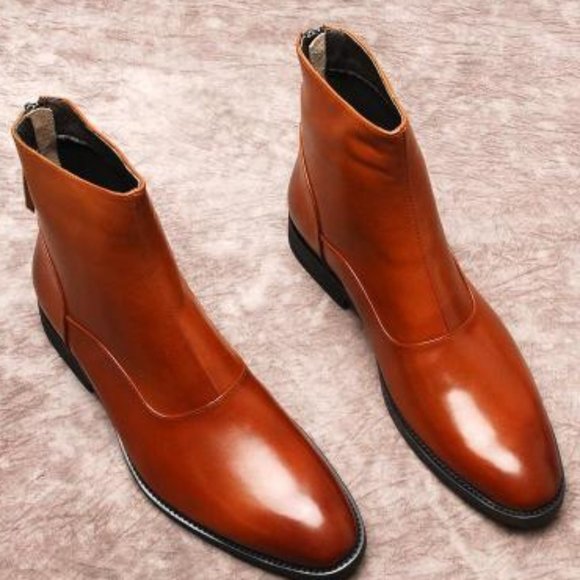 Pointed leather boots
